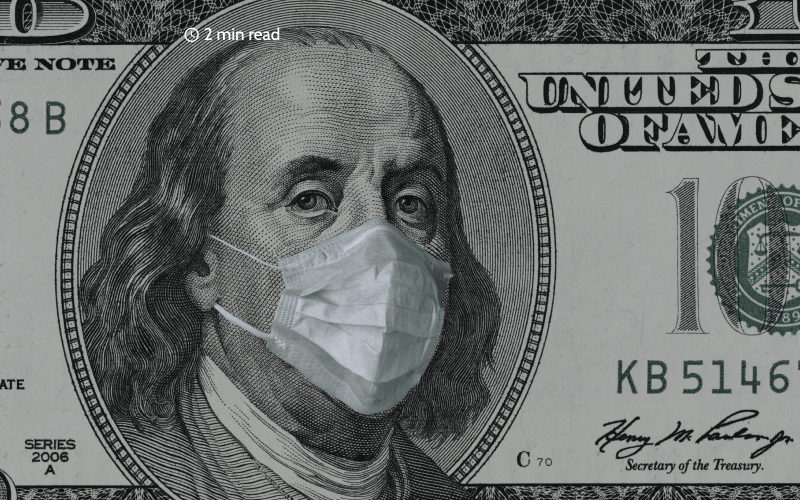 Benjamin Franklin portrait close-up on 100 dollars banknote in a medical mask. Close up.